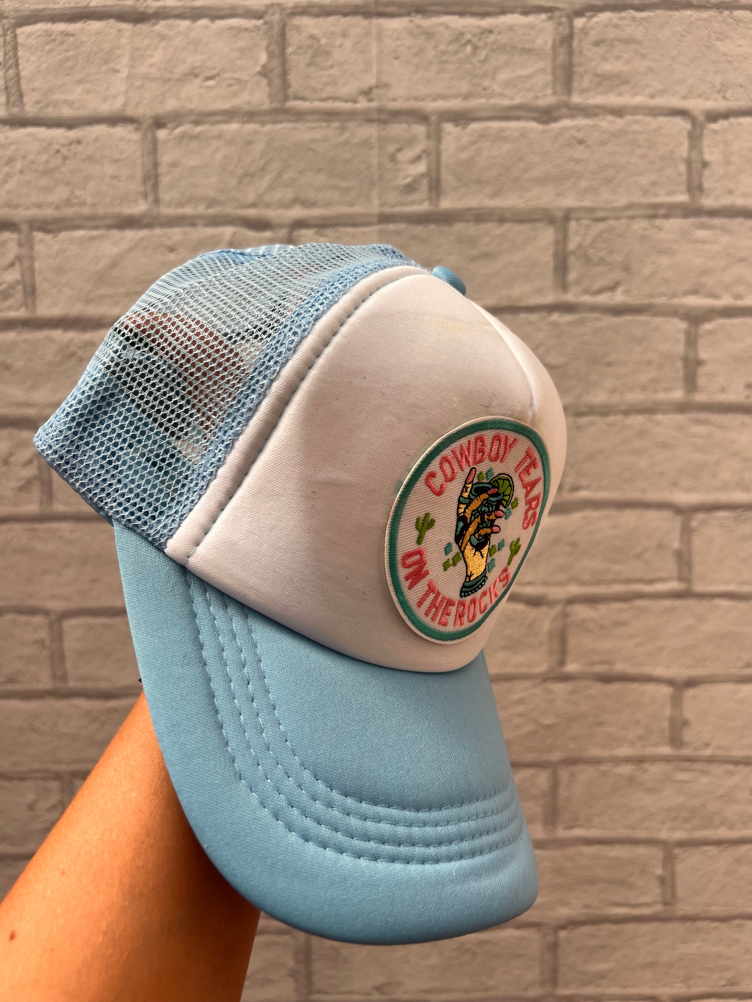 Cowboy tears on the rocks trucker hat