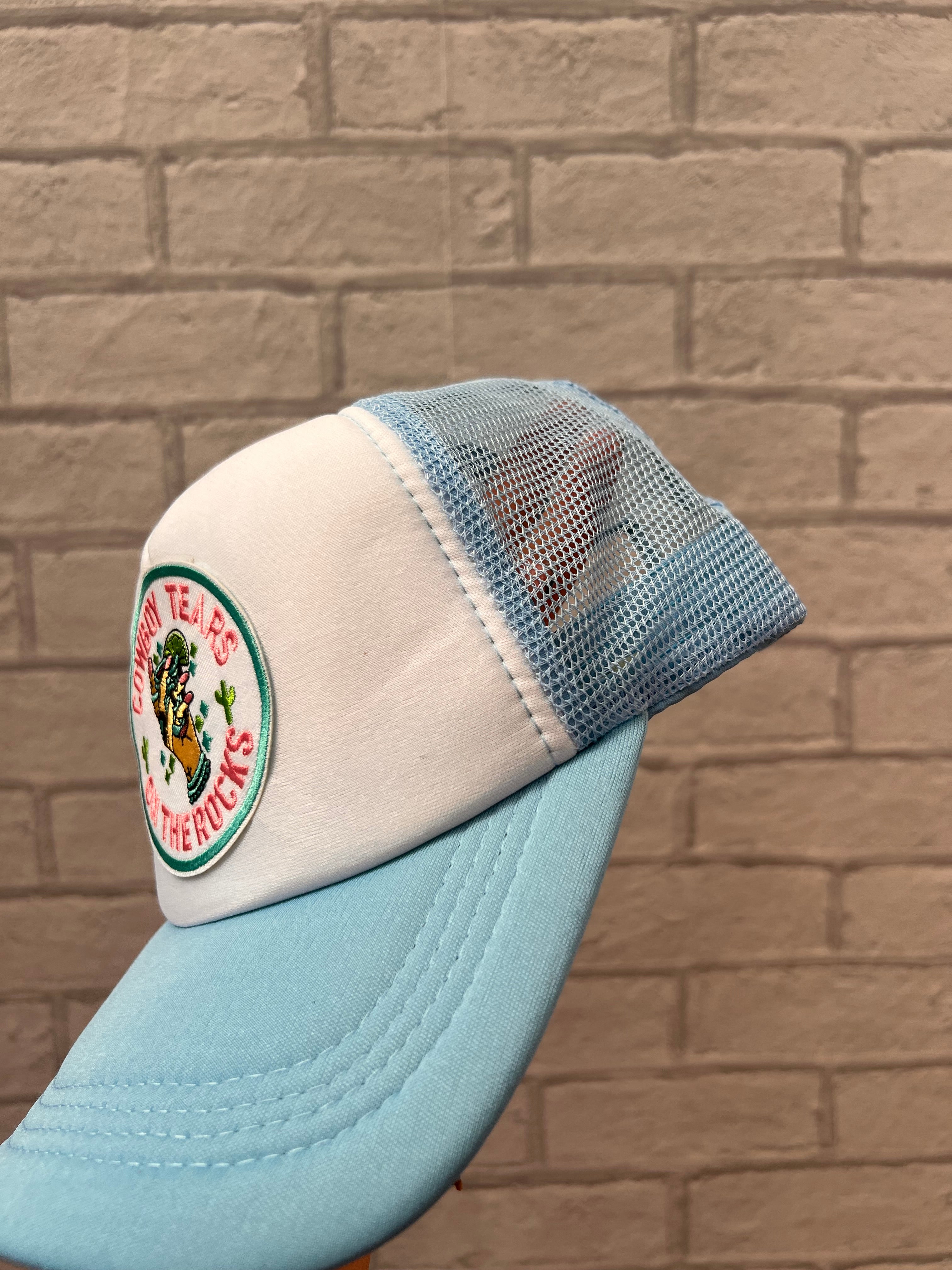 Cowboy tears on the rocks trucker hat