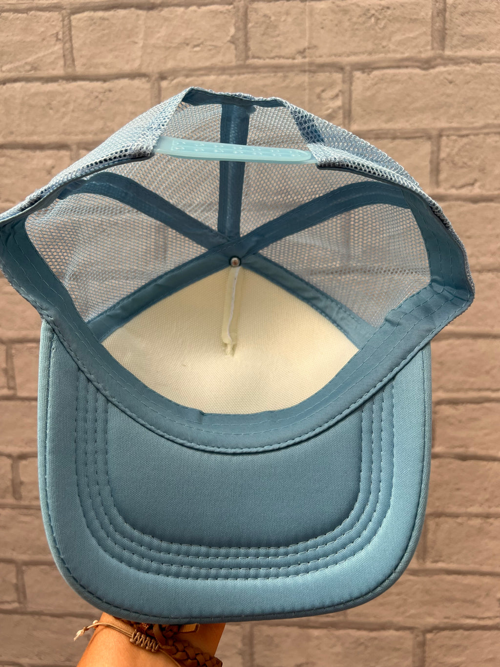 Cowboy tears on the rocks trucker hat