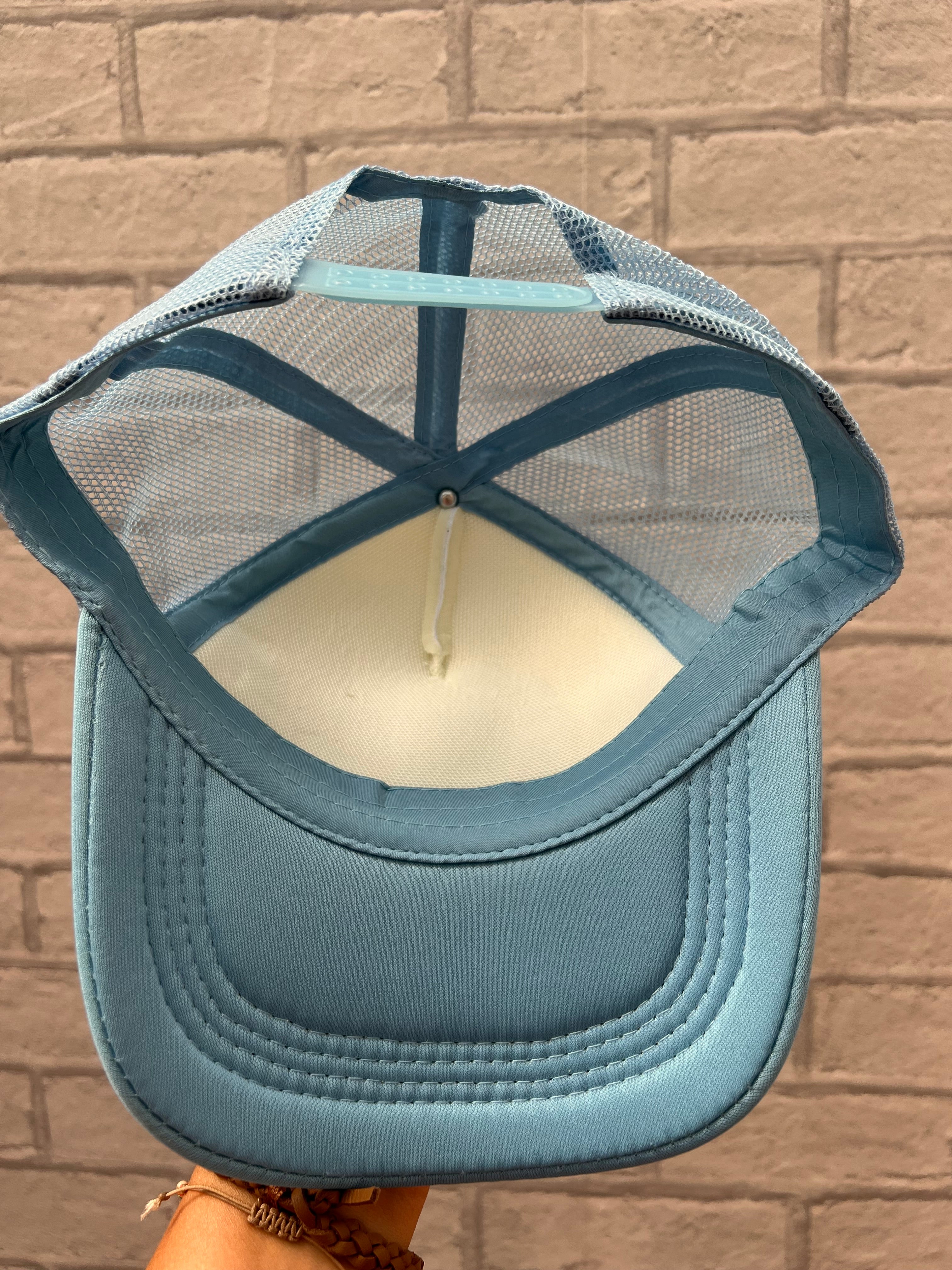 Cowboy tears on the rocks trucker hat